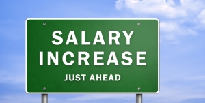 Road sign reading salary increase ahead